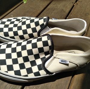 Size 6 black and white Vans in sturdy condition.